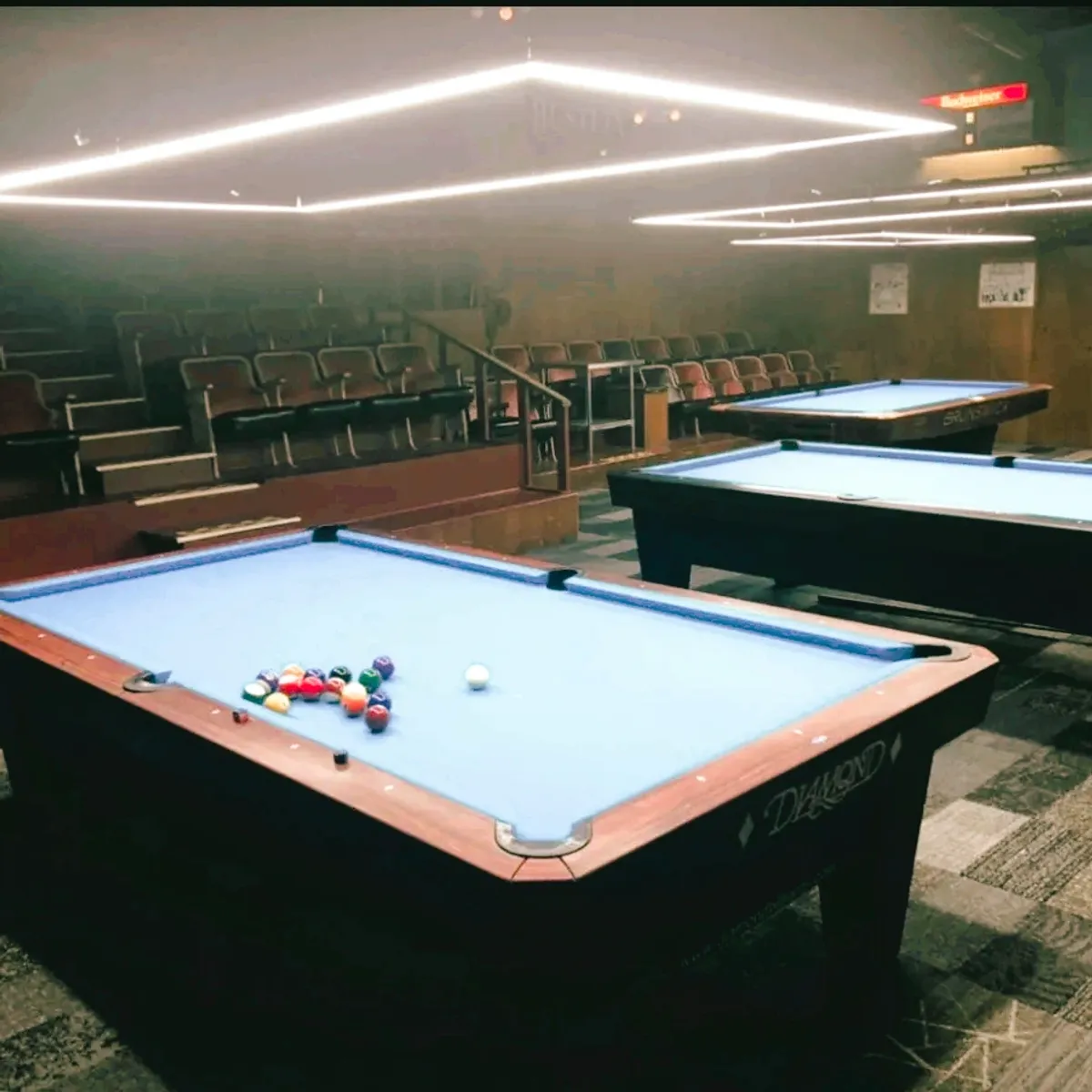 Jointed Cue Billiards pool hall exterior/interior