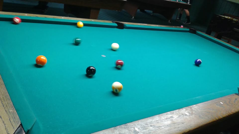 The Cue Ball Inc. pool hall exterior/interior