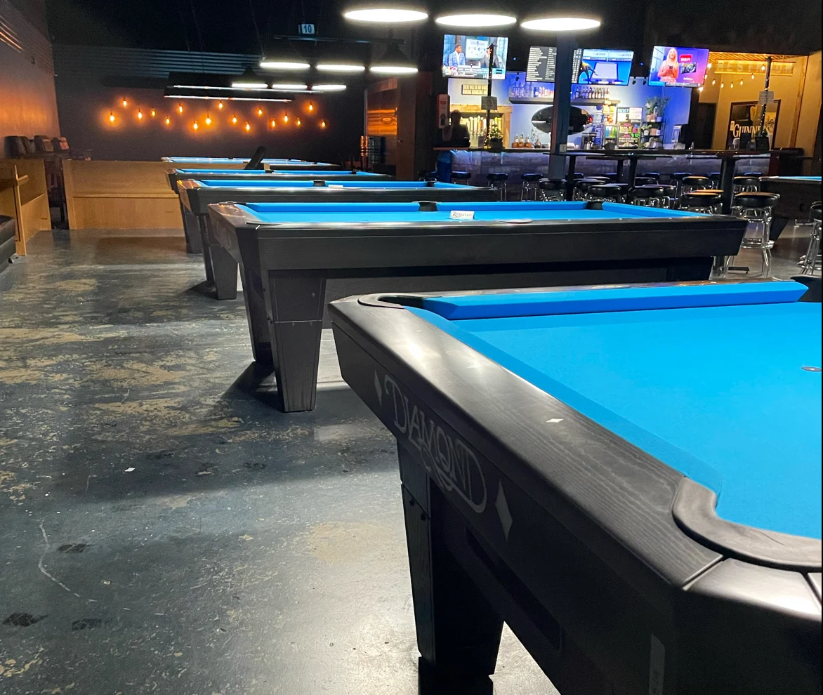 Pockets Billiards & Brew pool hall exterior/interior