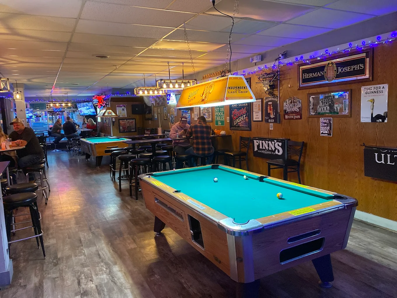 Finn's Neighborhood Pub pool hall exterior/interior