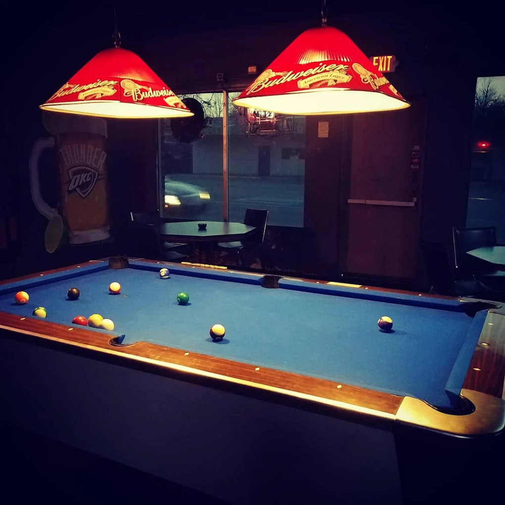 The Ugly Flamingo at 3020 pool hall exterior/interior