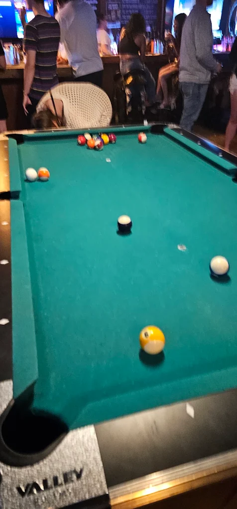 Nocturnal pool hall exterior/interior