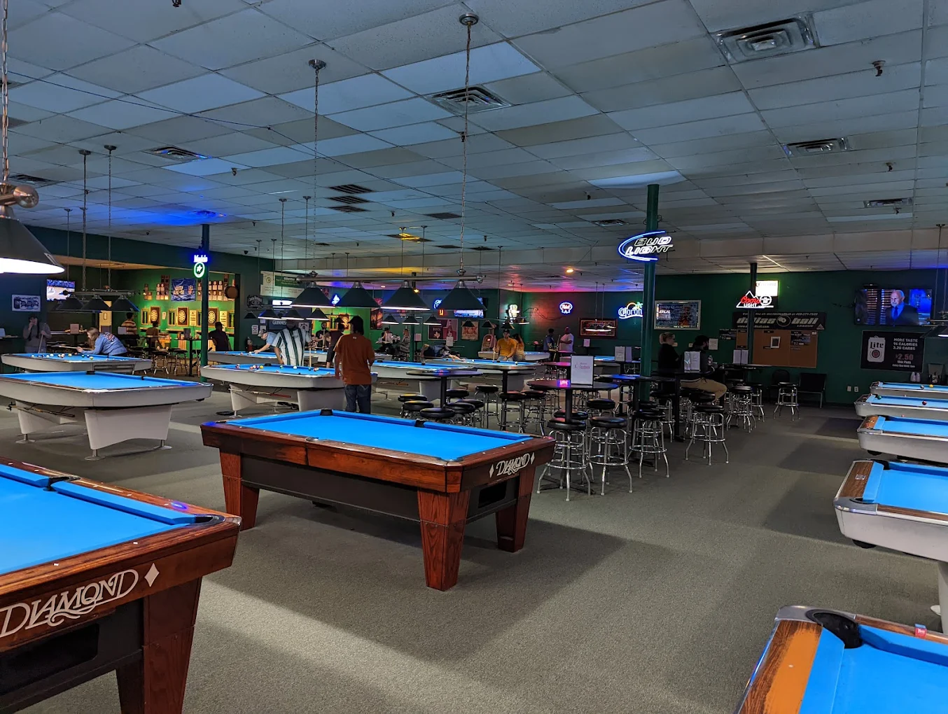 The Billiard Den pool hall exterior/interior