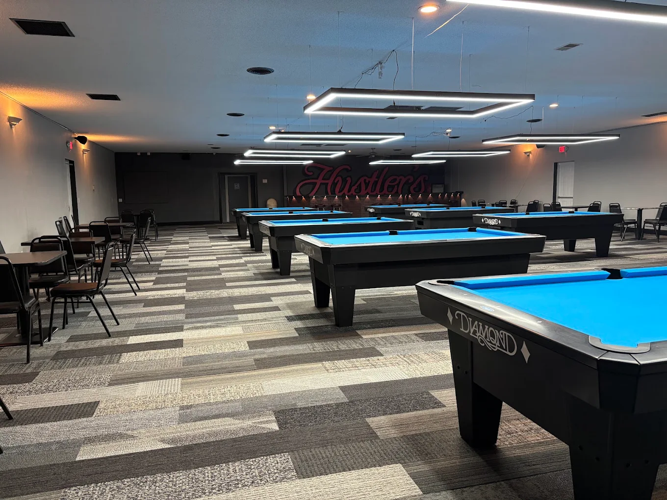 Hustler's Pizza and Billiards pool hall exterior/interior